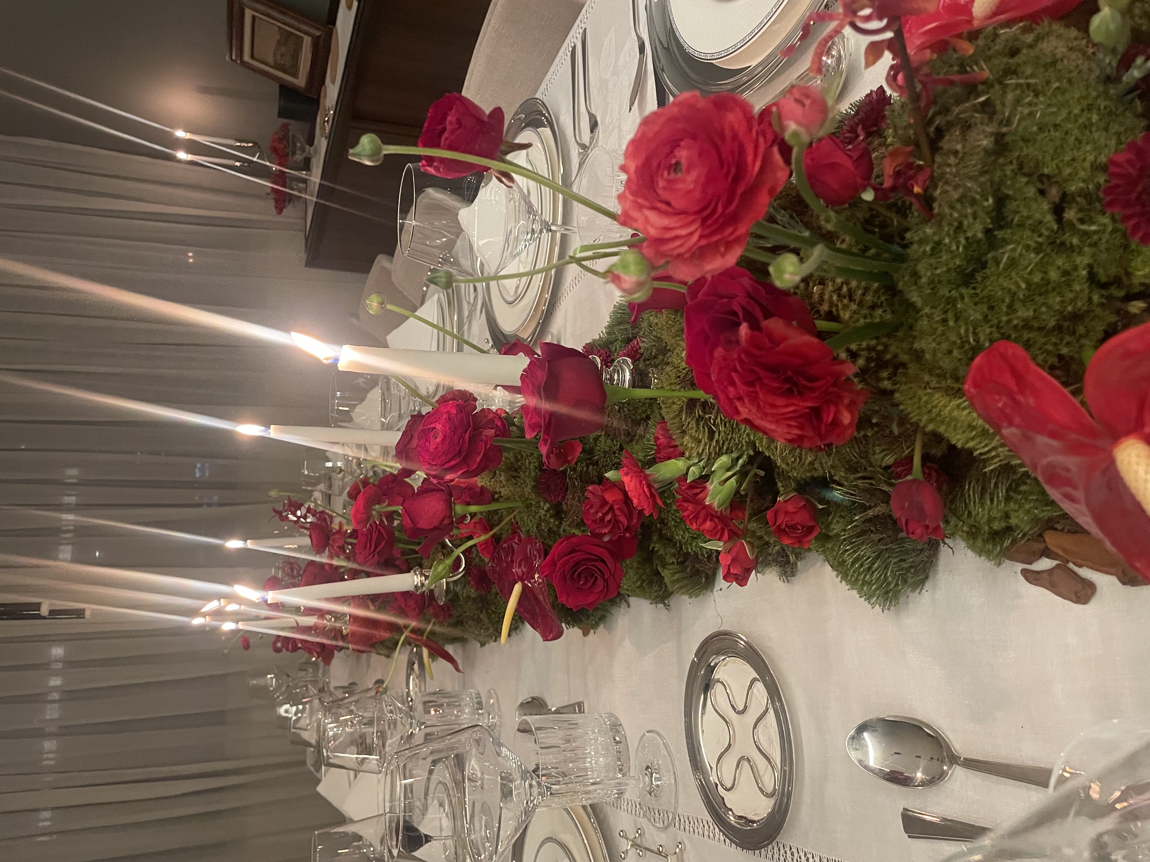 Formal dinner table with floral runner