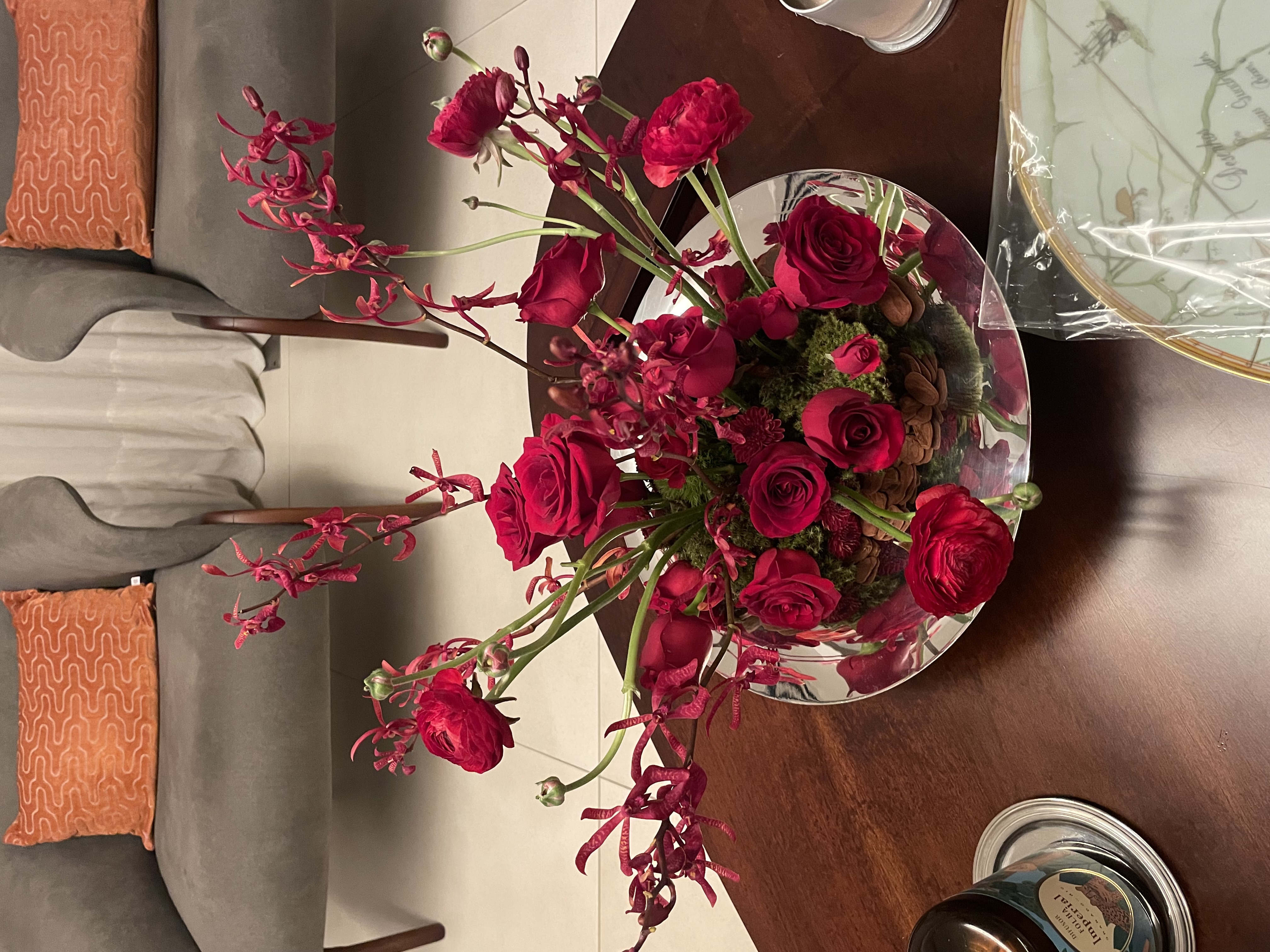 Red rose and orchid arrangement